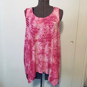 Soft striped tank top with handkerchief hem.